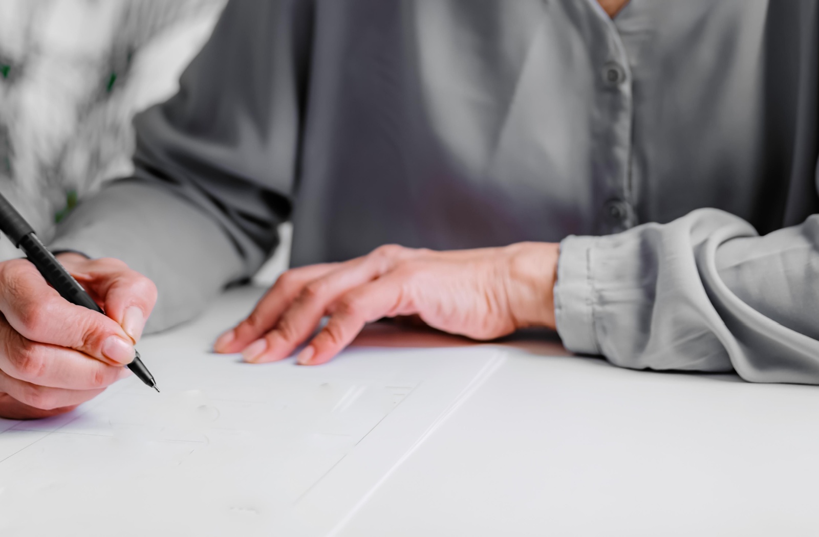 An older adult person taking the 5-word memory test.